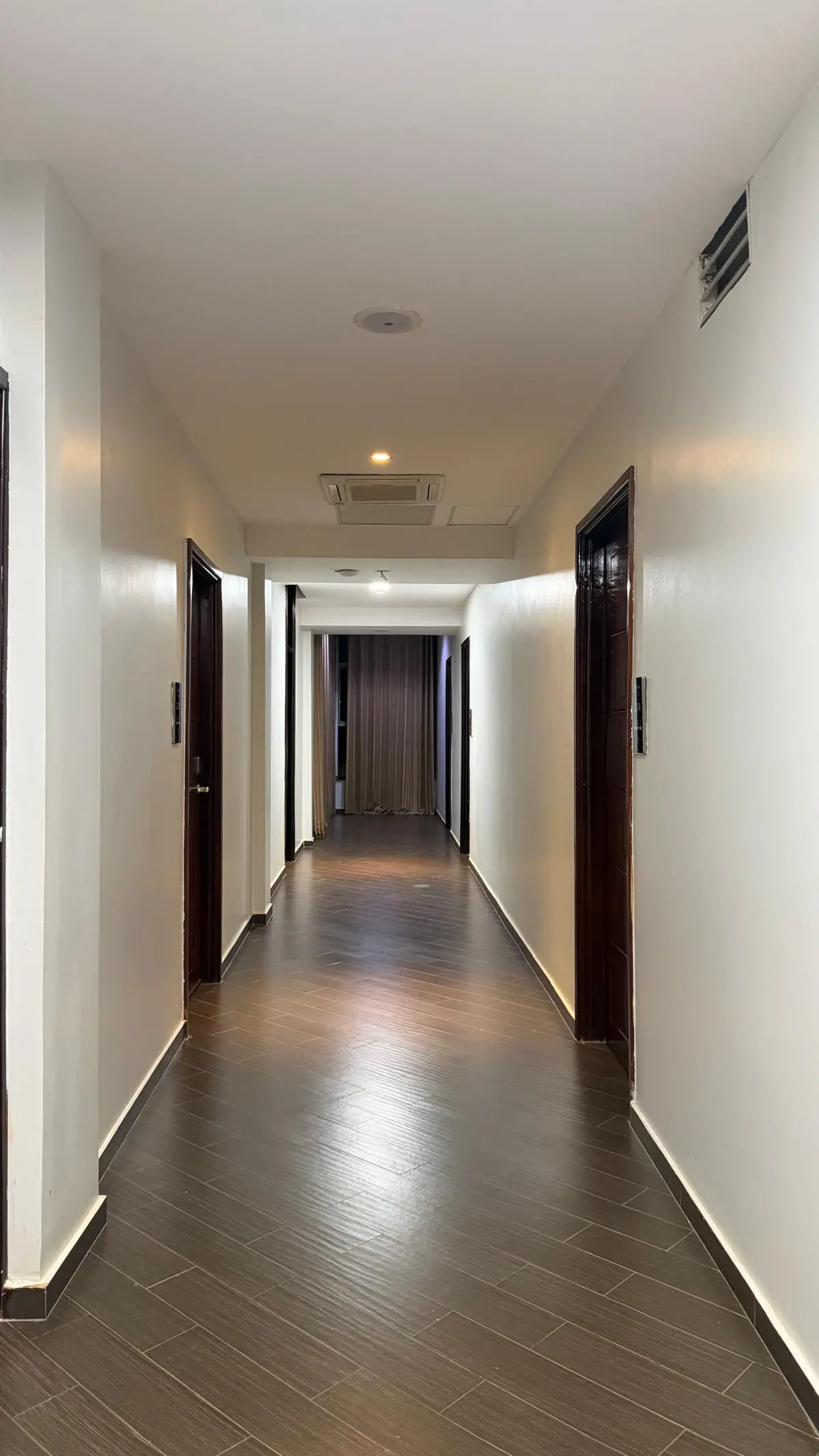 A corridor at Nexus Resorts Hotel Plus