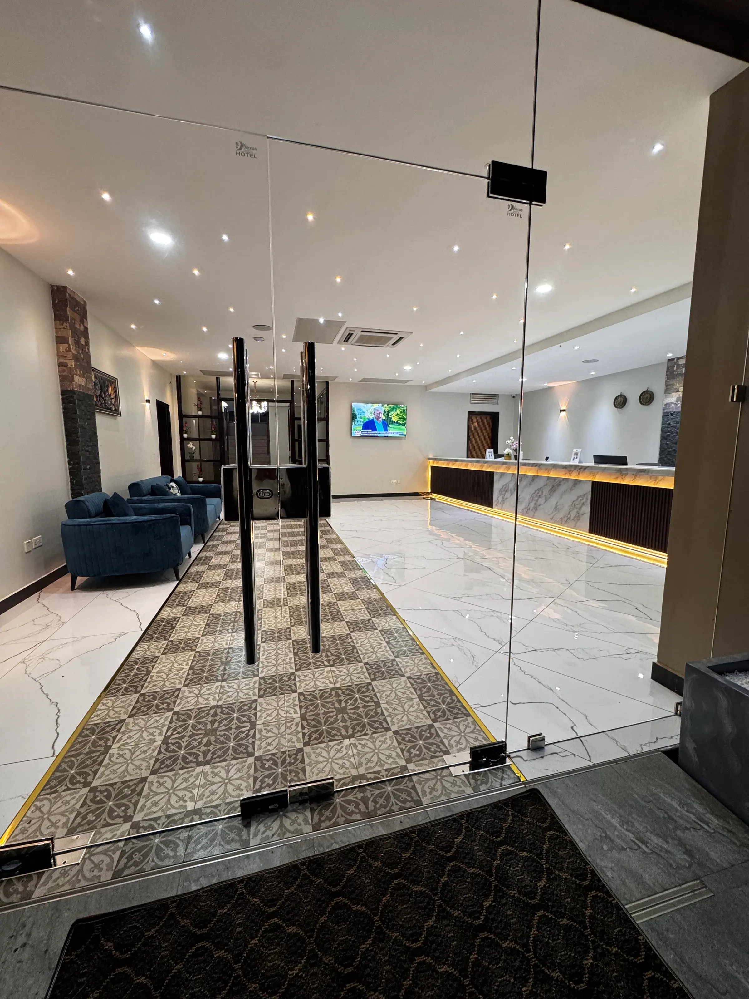 The lobby and reception at Nexus Resorts Hotel Plus
