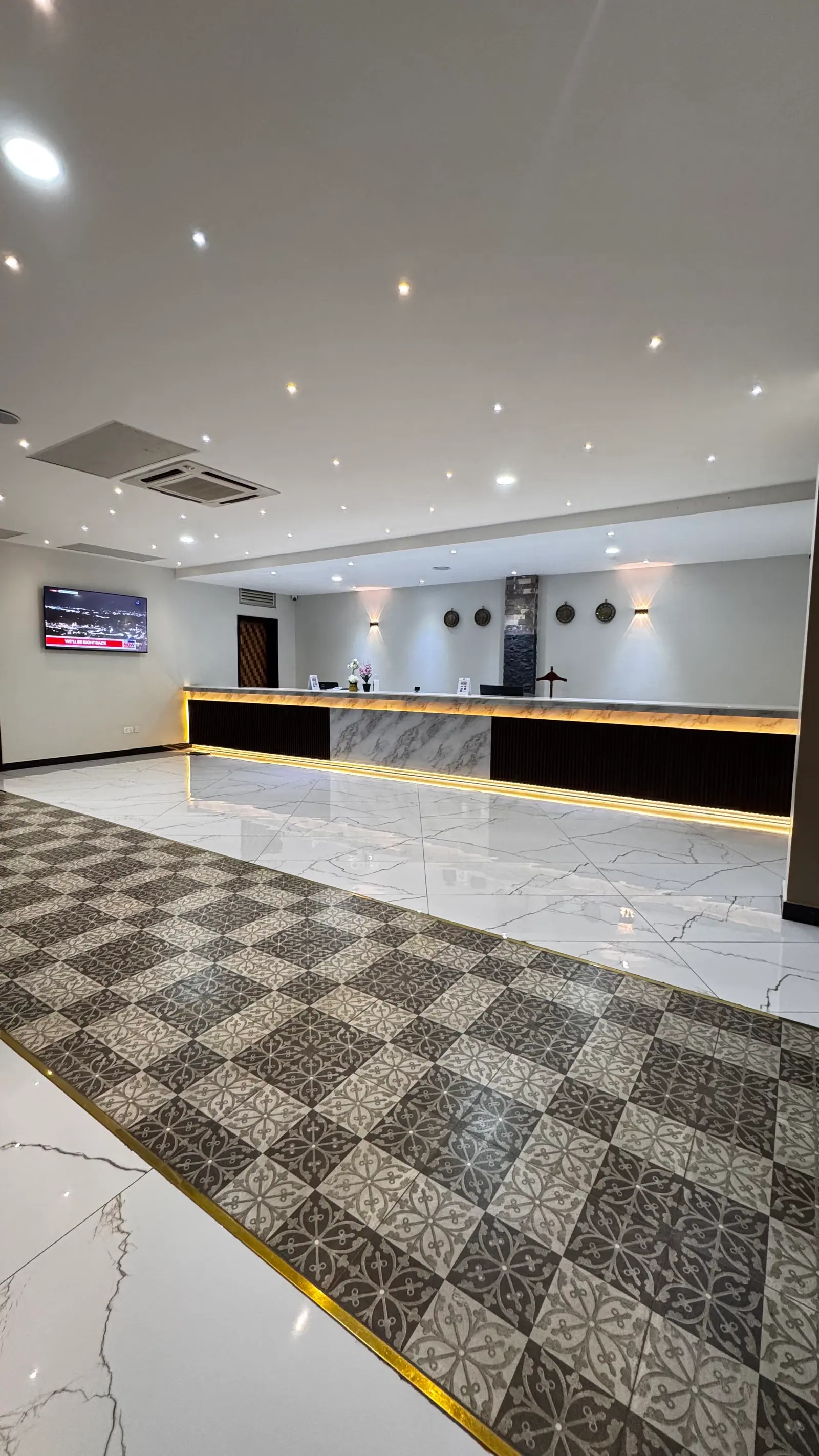 The lobby and reception at Nexus Resorts Hotel Plus
