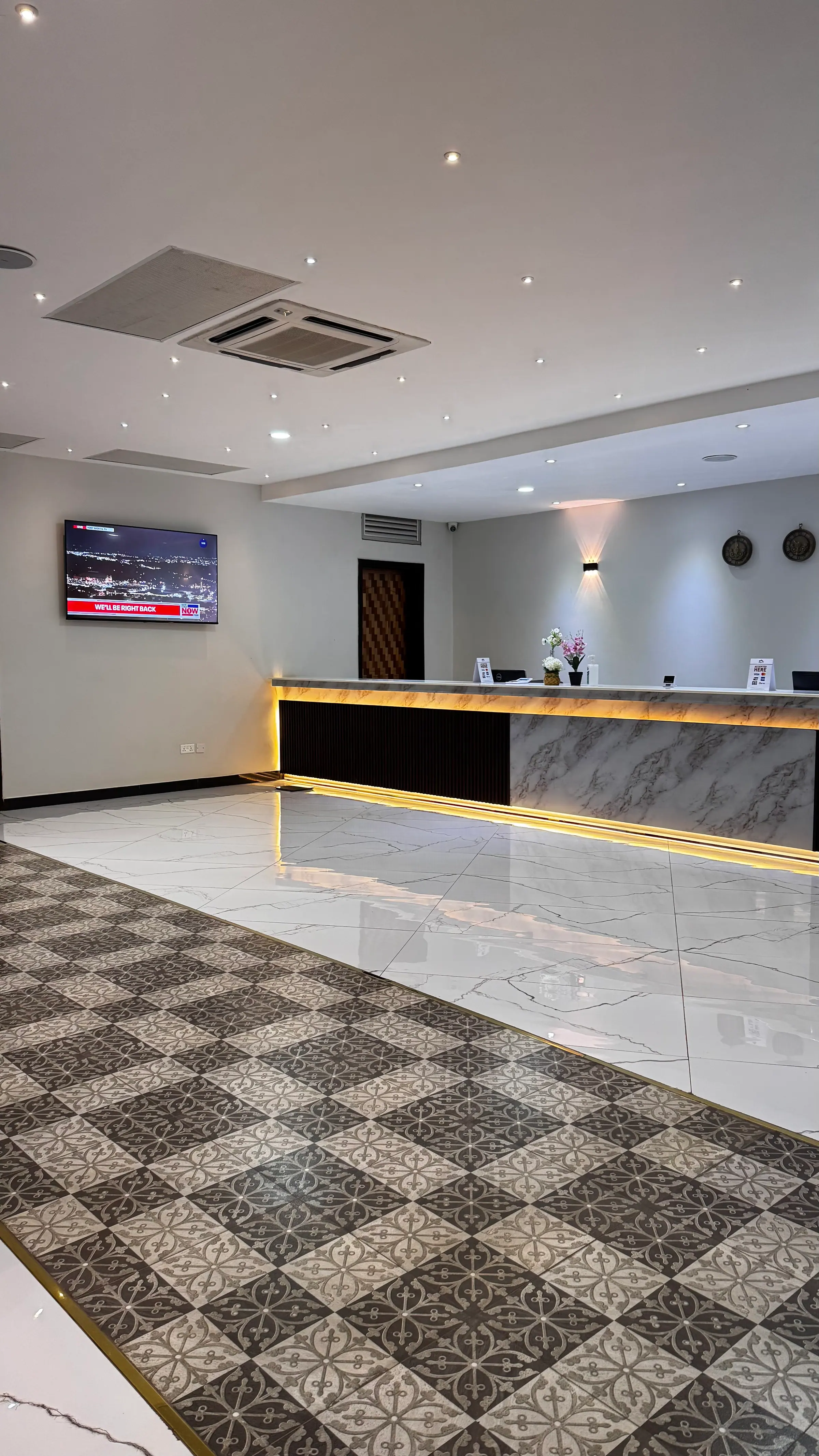 The lobby and reception at Nexus Resorts Hotel Plus