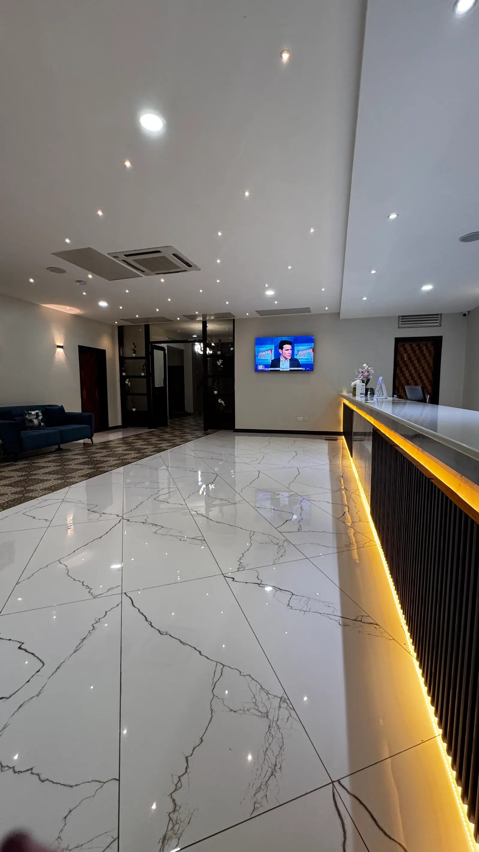 The lobby and reception at Nexus Resorts Hotel Plus